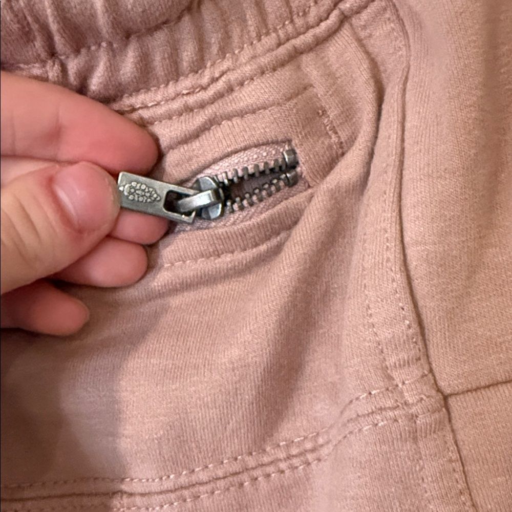 Free People movement dusty rose colored joggers with ankle zip and drawstring - Picture 2 of 13